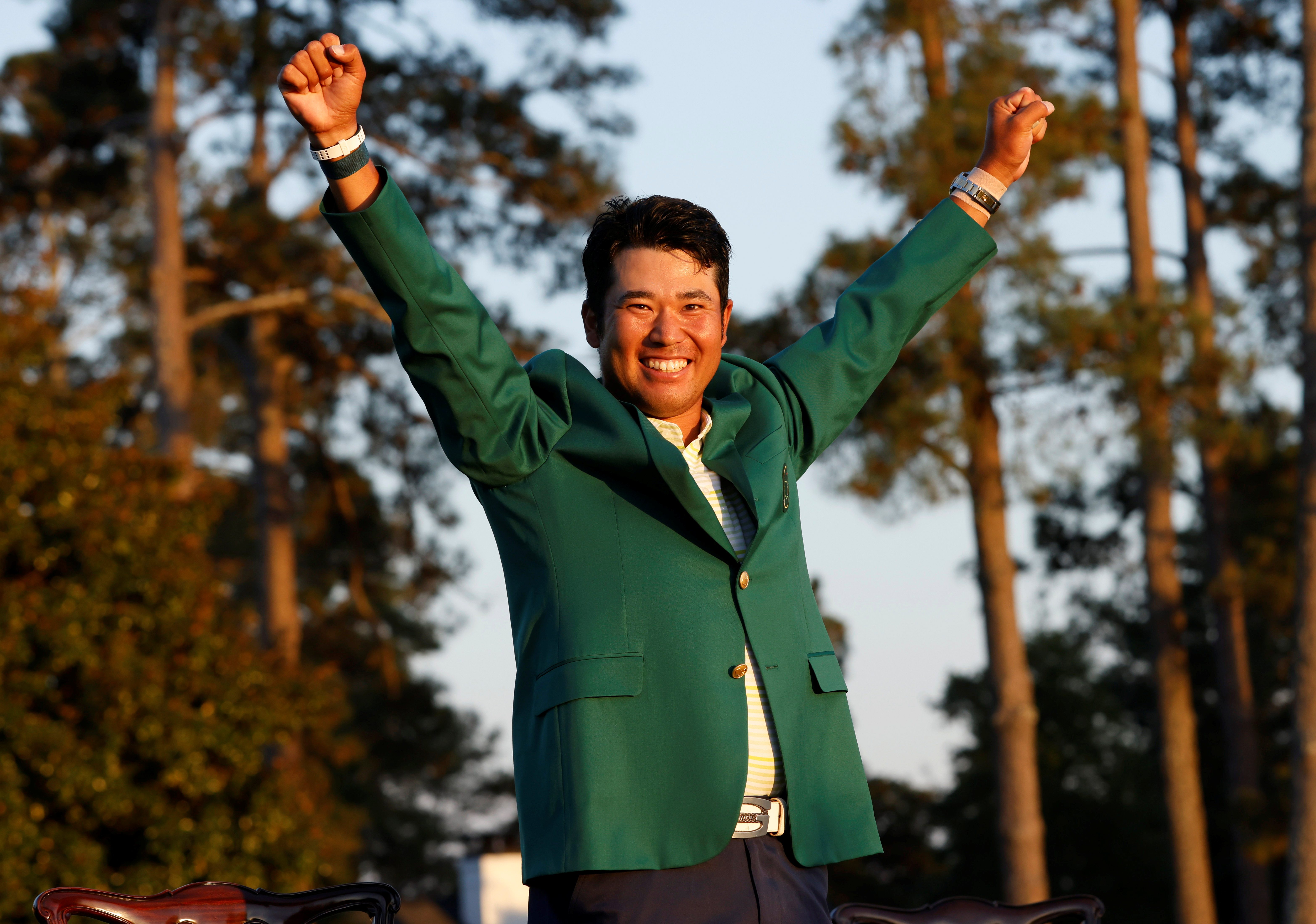 Japan’s Hideki Matsuyama hangs on to make history with Masters win