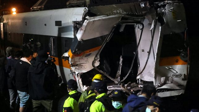 Taiwan rescuers work to bring out last body from wrecked train