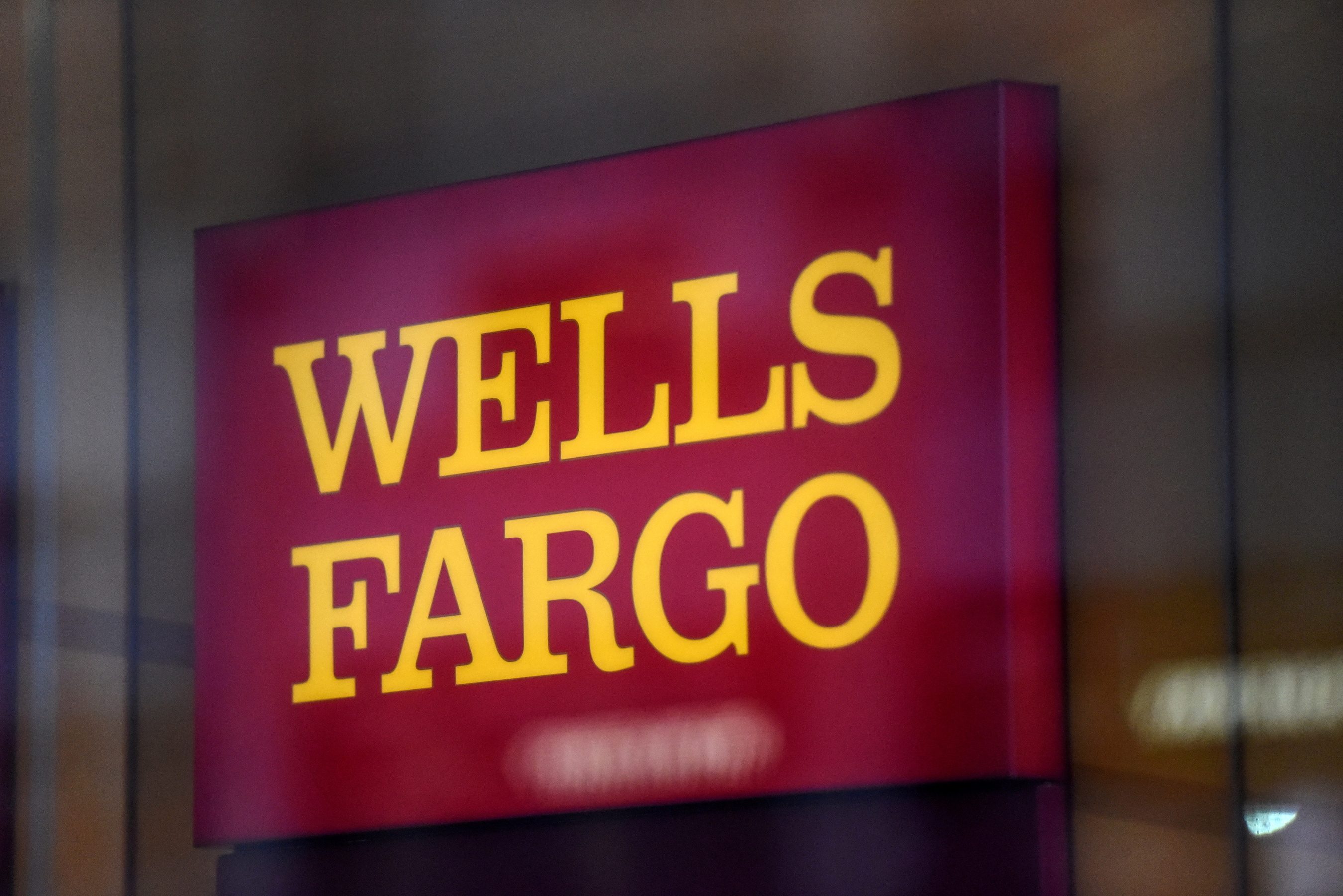 Wells Fargo profit boosted by lower reserves, easing sales scandal costs
