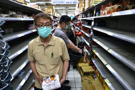 Taiwan urges no panic buying as new COVID-19 rules kick off
