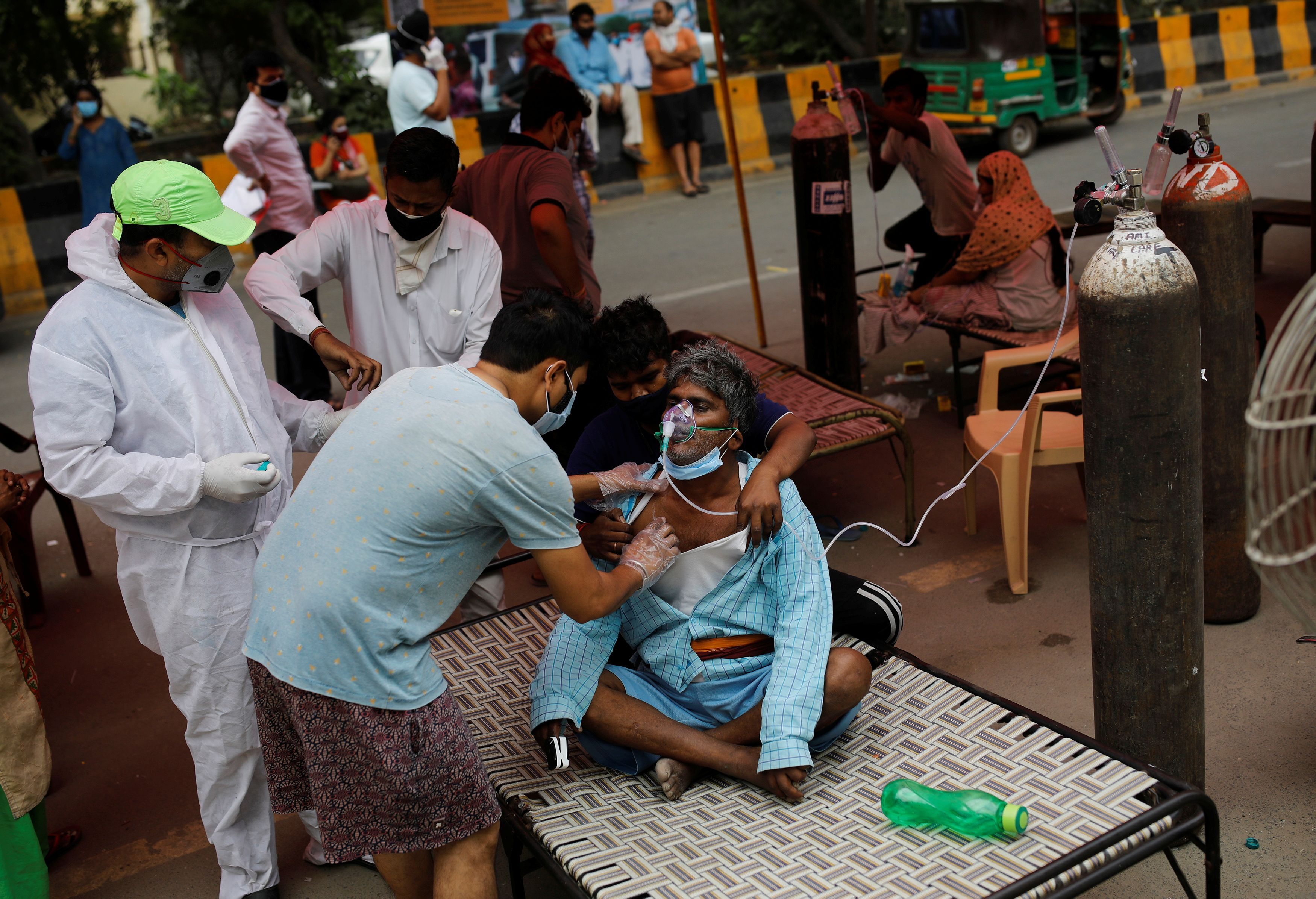 Opposition chief calls for national lockdown as India’s coronavirus cases cross 20 million