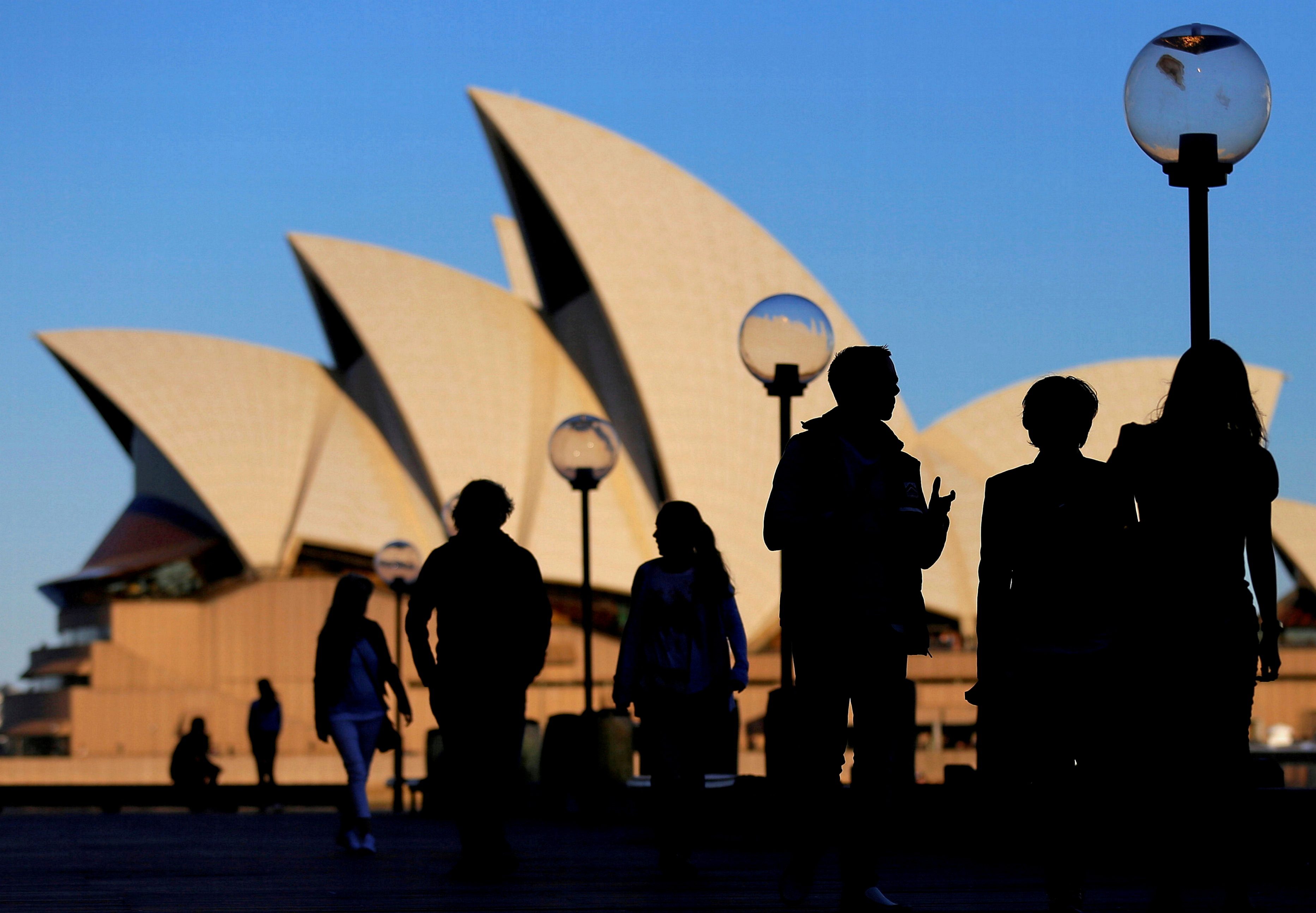 Australia unveils years of budget deficits to sustain recovery