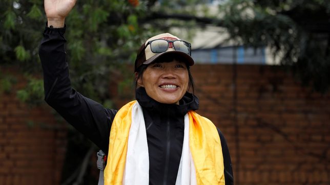 Tired but safe: Everest climbers set new records