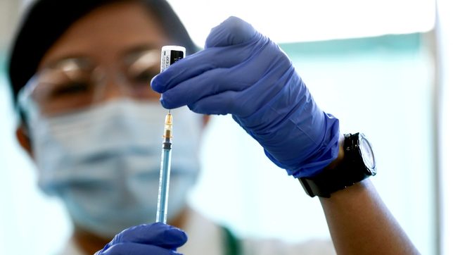 Japan approves more COVID-19 vaccines, expands state of emergency