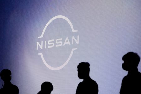 In court, former Nissan executive Kelly denies helping Ghosn hide earnings