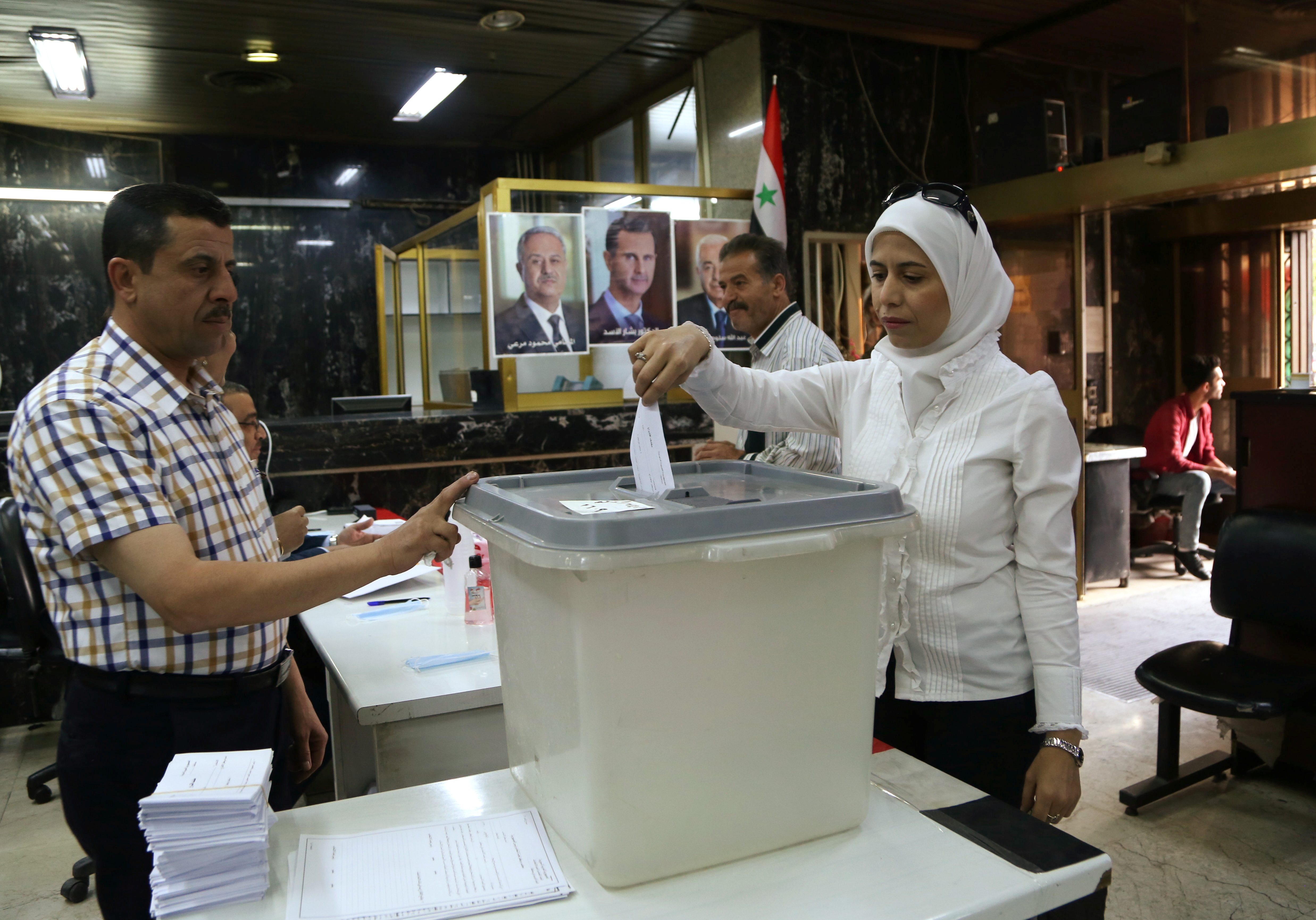 Syrians go to the polls in election that Assad is set to win