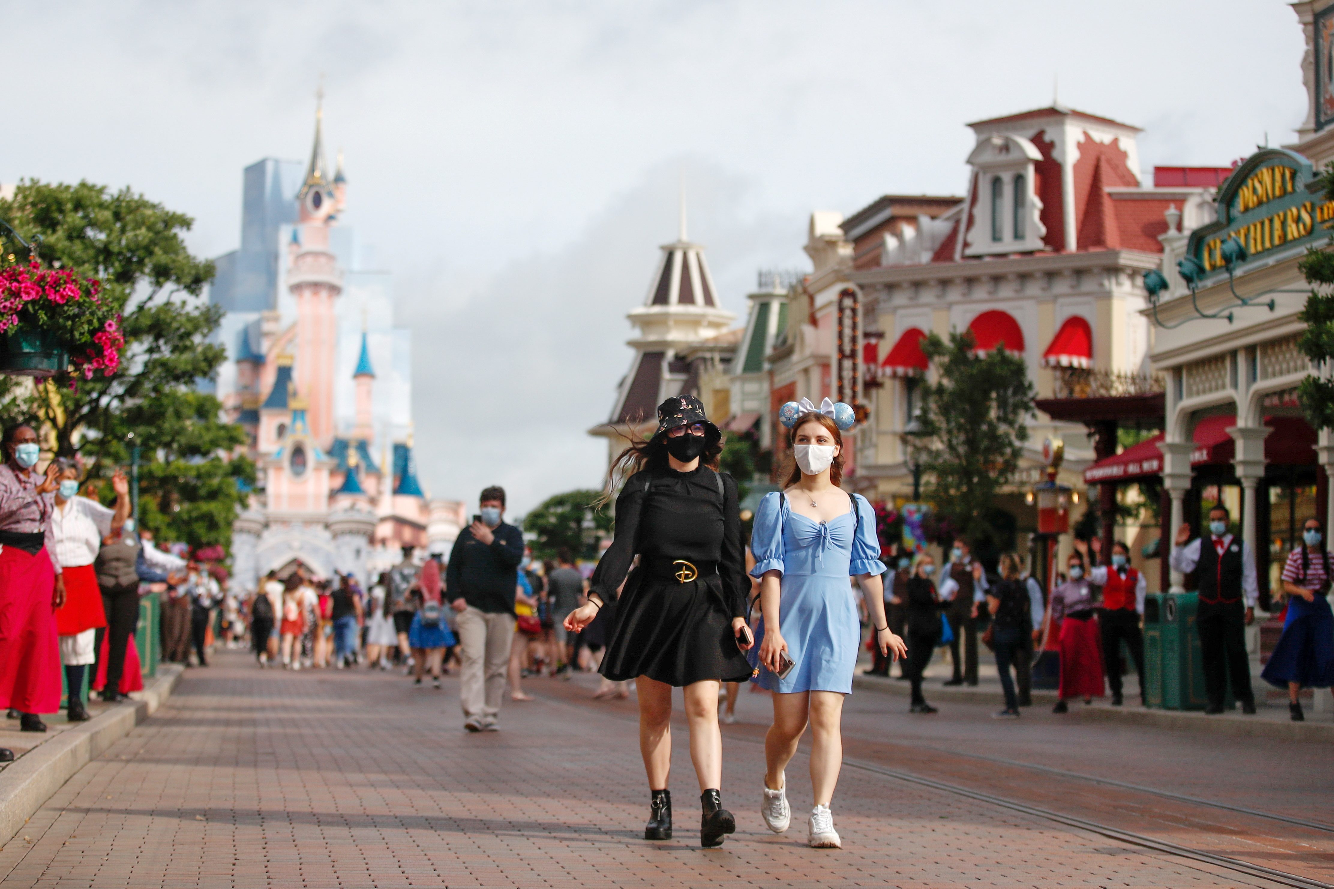 Disneyland Paris reopens, but Mickey Mouse won’t give hugs
