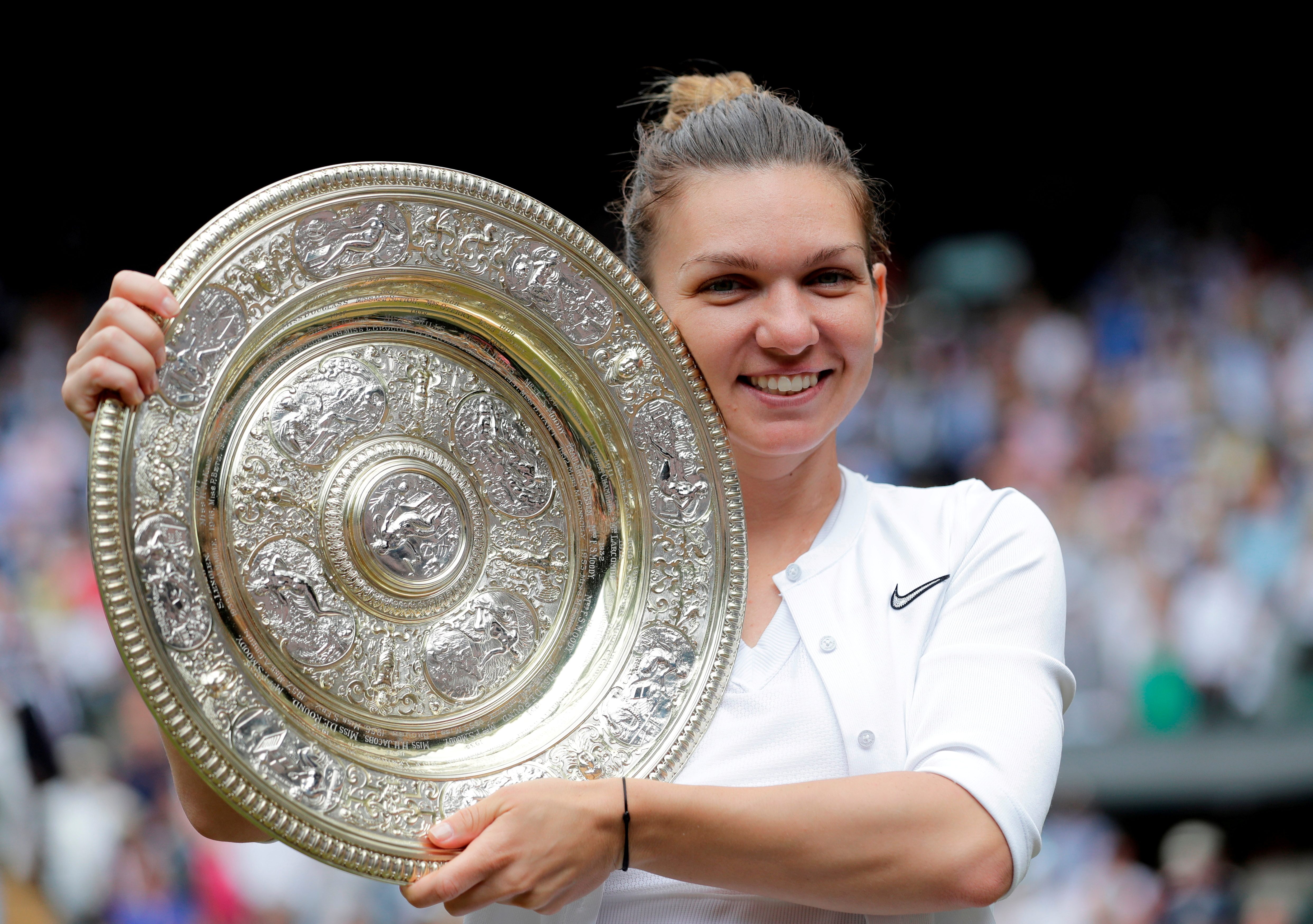 Defending champion Halep withdraws from Wimbledon with calf injury