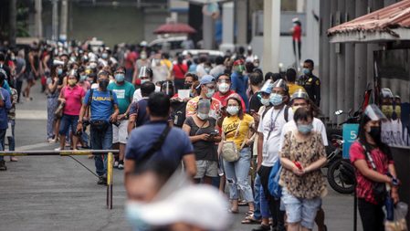 With no fixed schedule, Manila residents wait up to 8 hours to get jabs