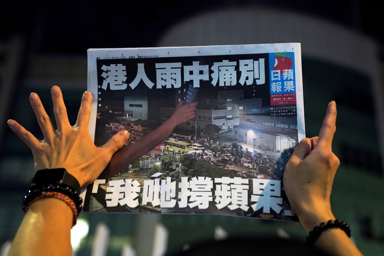 Emotions run high as Hong Kong residents snap up final edition of Apple Daily