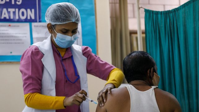 India to give adults free COVID-19 shots after bungled vaccine rollout