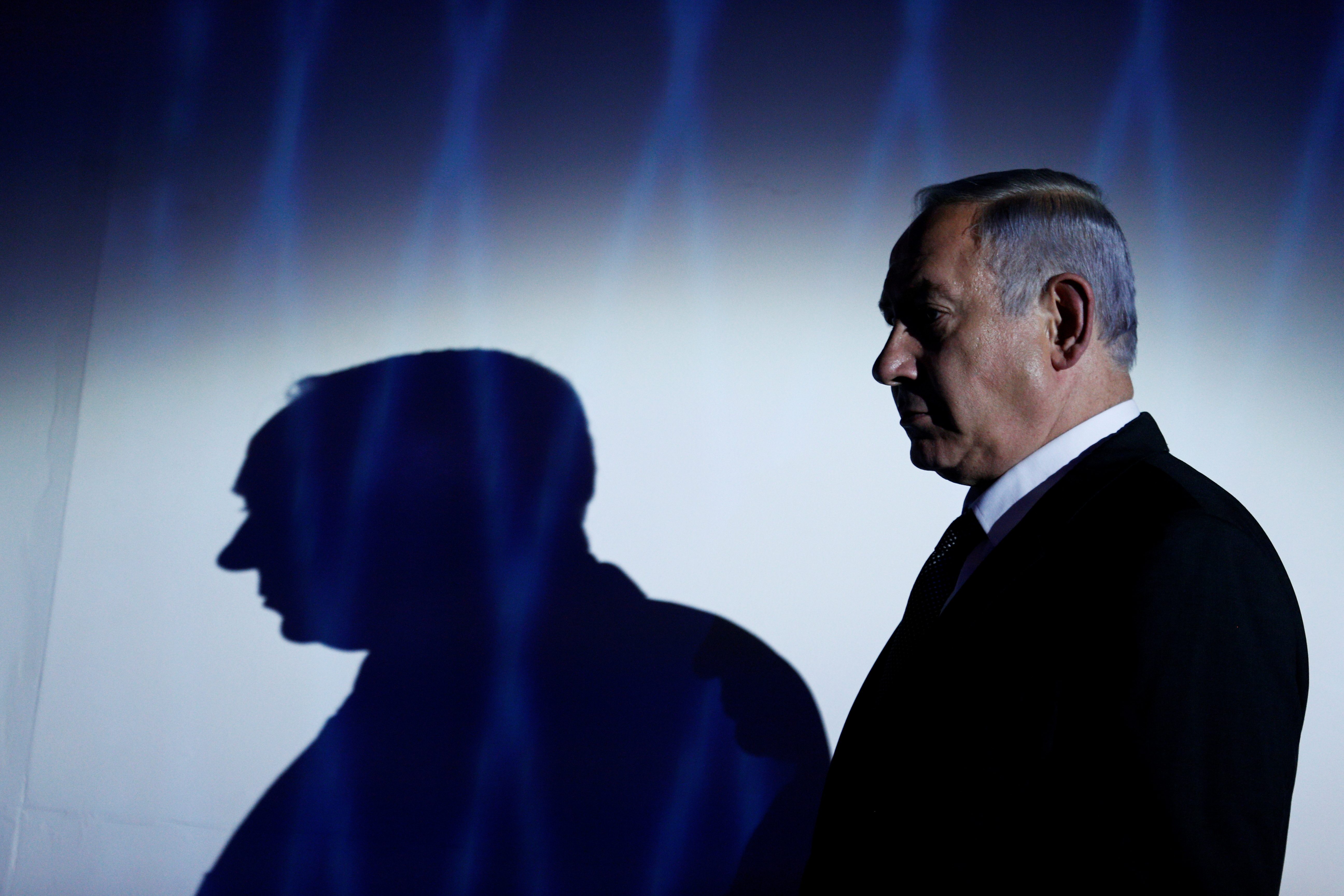 Netanyahu, battling for political life, attacks deal to unseat him