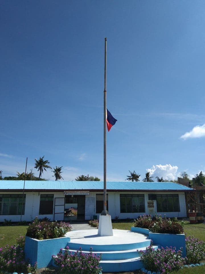 LOOK: Pag-asa Island in West PH Sea flies flag at half-mast for Aquino