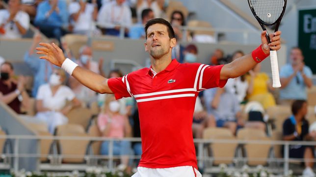 Djokovic fights back to win second French Open title