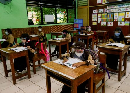COVID-19 rising among children as Indonesia crisis grows