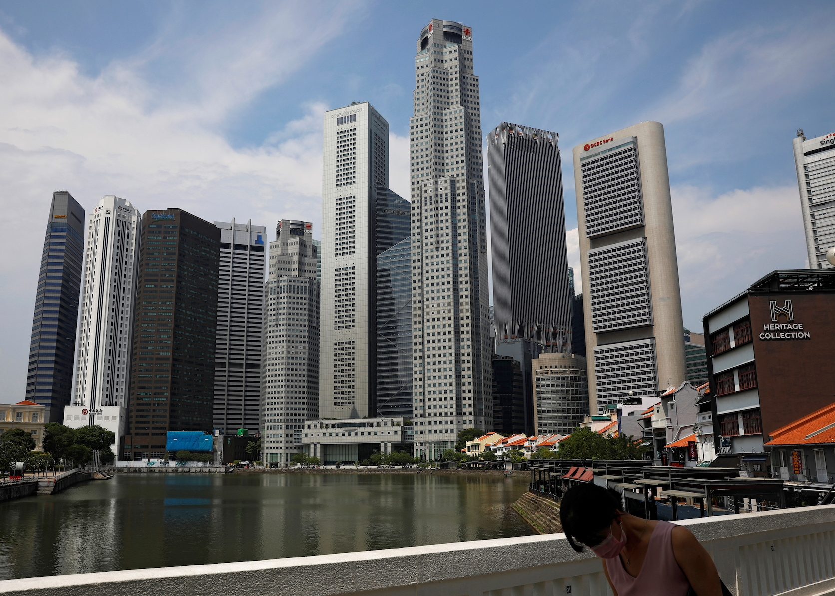 Singapore must remain open as anxiety over job competition grows – Lee