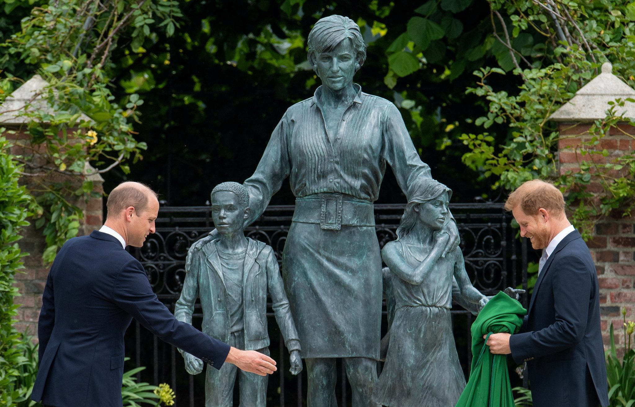 Britain’s William and Harry put feud aside to unveil Princess Diana statue