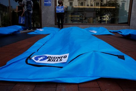 LOOK: ‘Disinfo kills’ body bags laid out in protest against Facebook