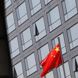 China Evergrande onshore bond trading suspended after downgrade