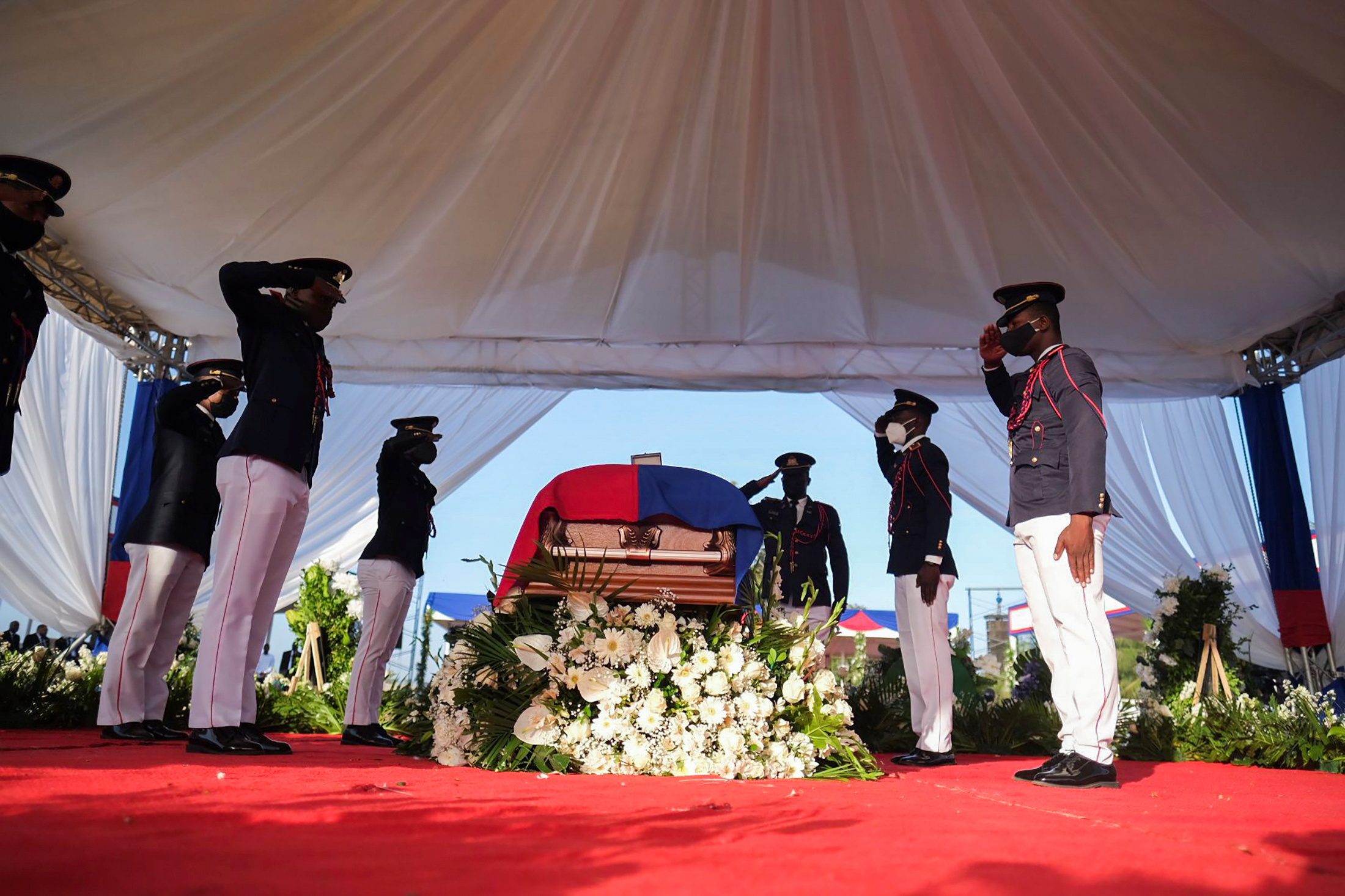 Haiti’s murdered president laid to rest as tensions flare
