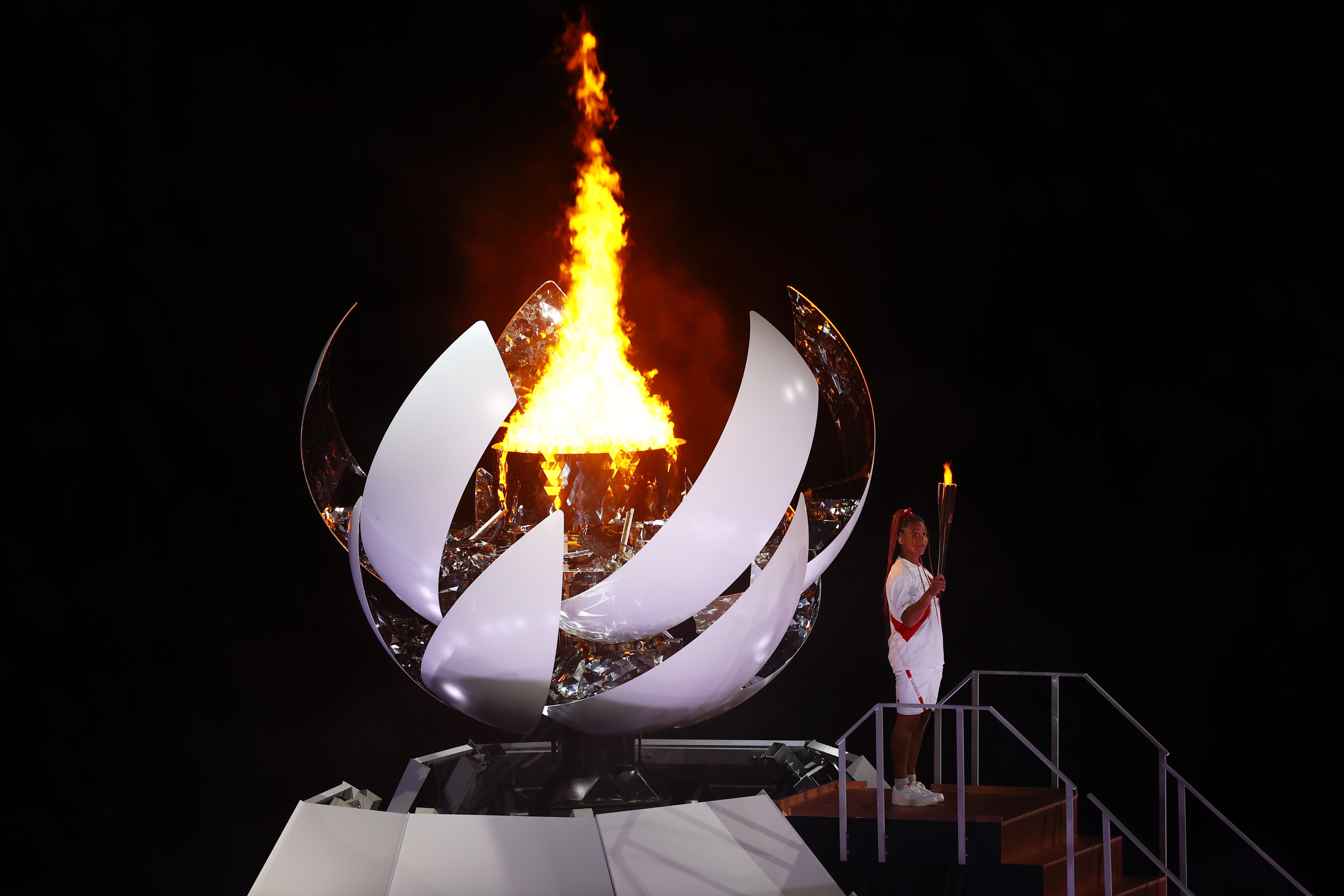 Naomi Osaka lights flame as Tokyo’s ‘games of hope’ open