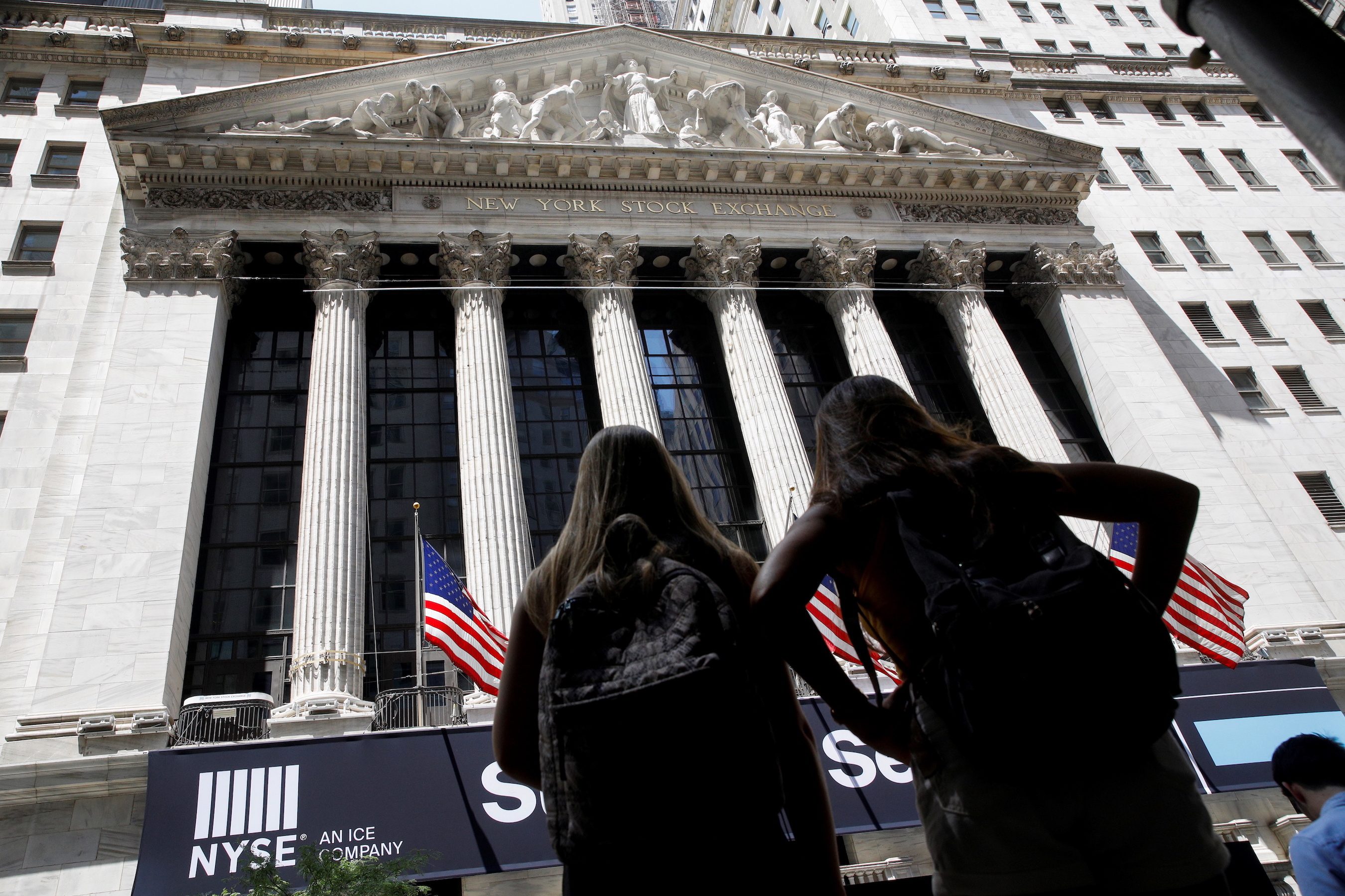 Wall Street closes higher, Treasury yields rebound despite COVID-19 variant fears