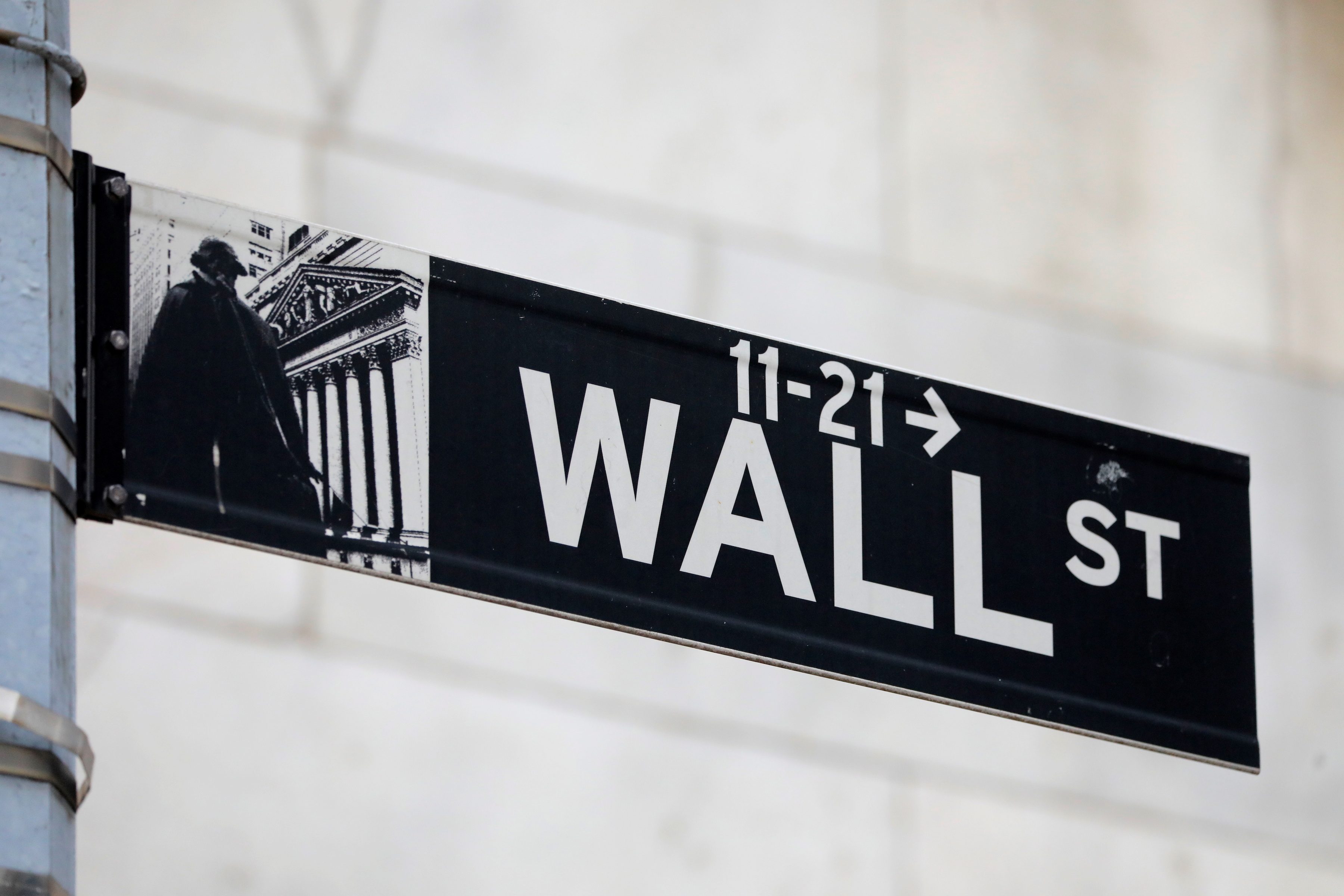 US fines 16 Wall Street firms $1.8 billion for talking deals, trades on personal apps