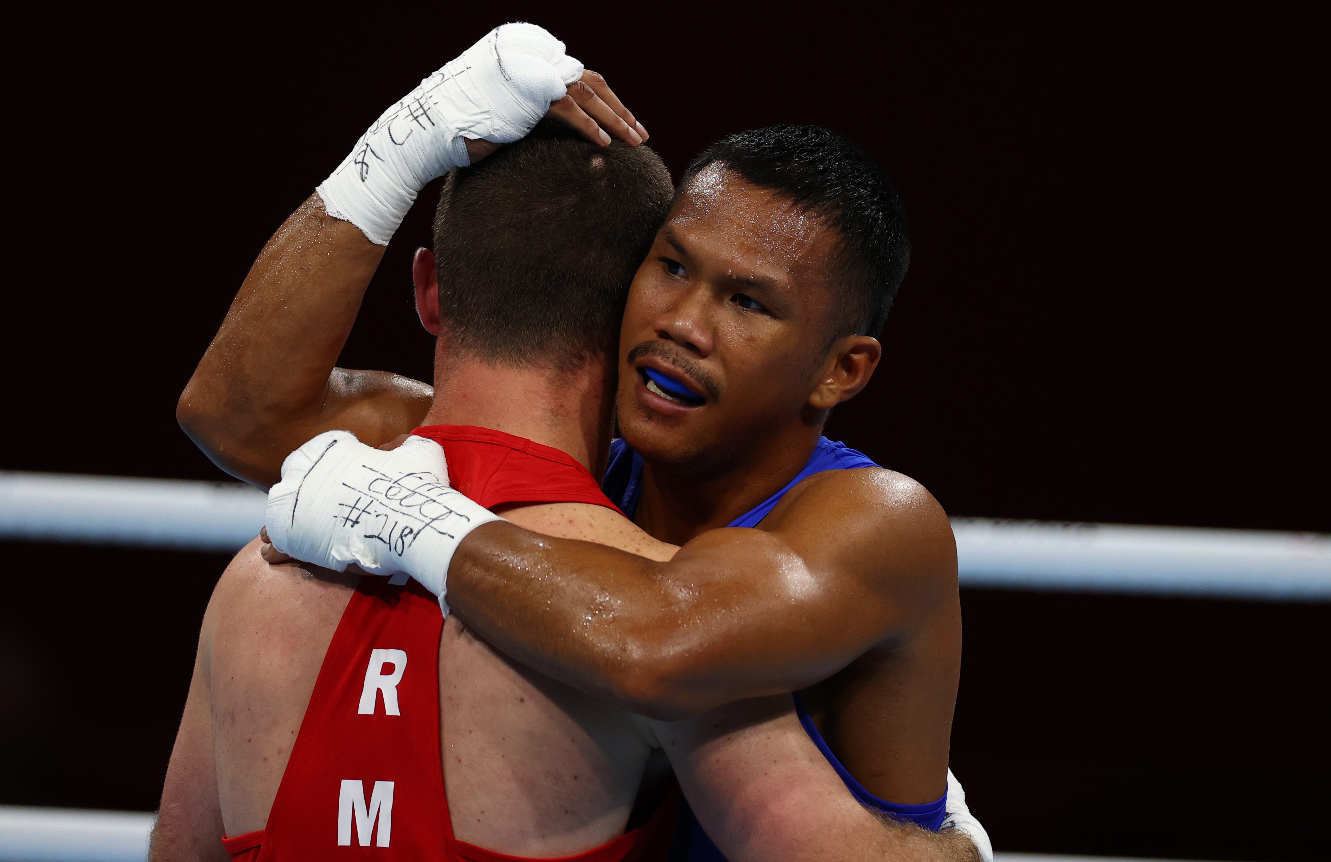 Eumir Marcial KOs way to sure Olympic boxing bronze