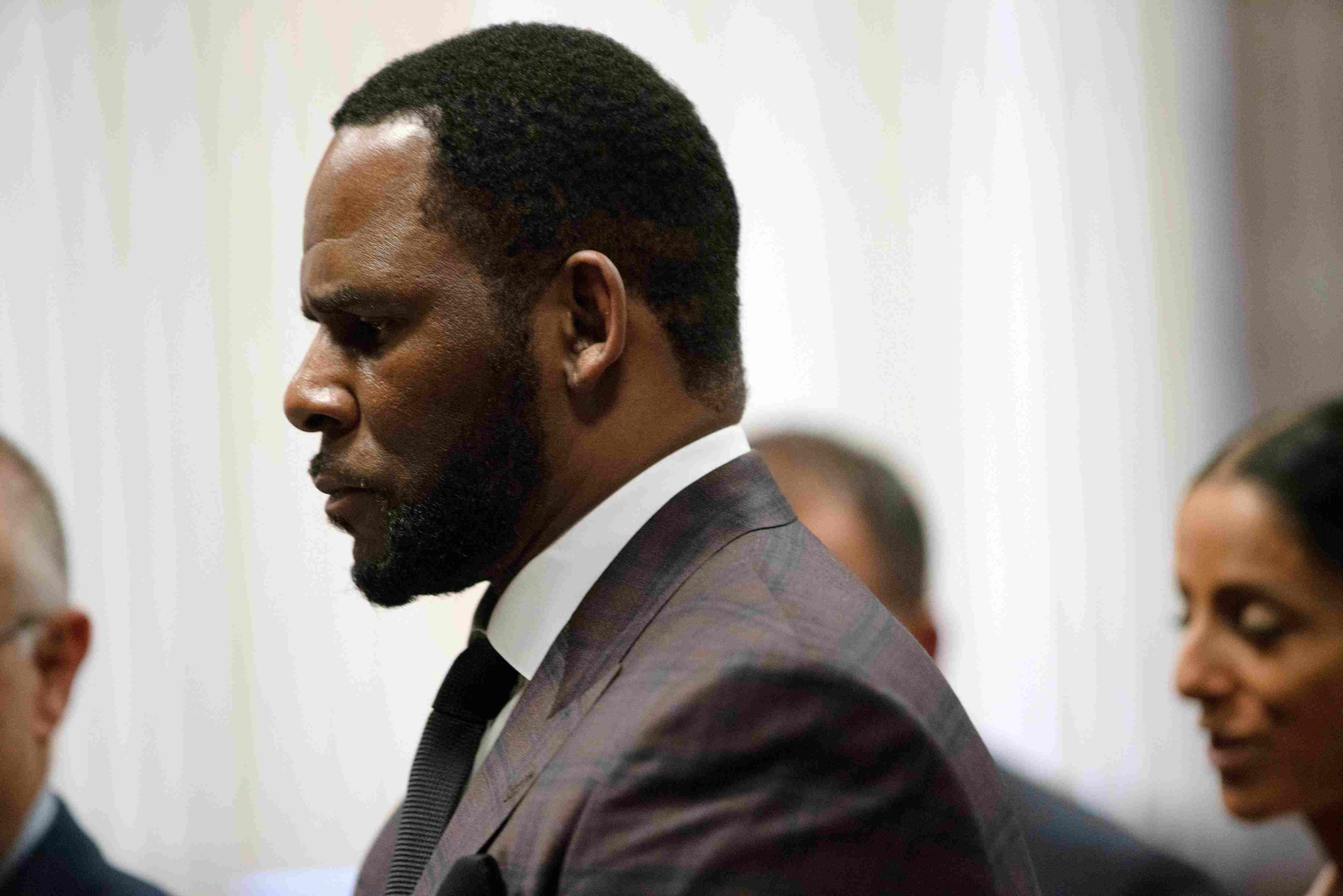 Woman says R. Kelly prostituted her, singer’s lawyer challenges claims