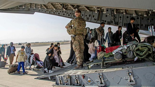 Evacuations from Afghanistan gain momentum as Taliban promise peace