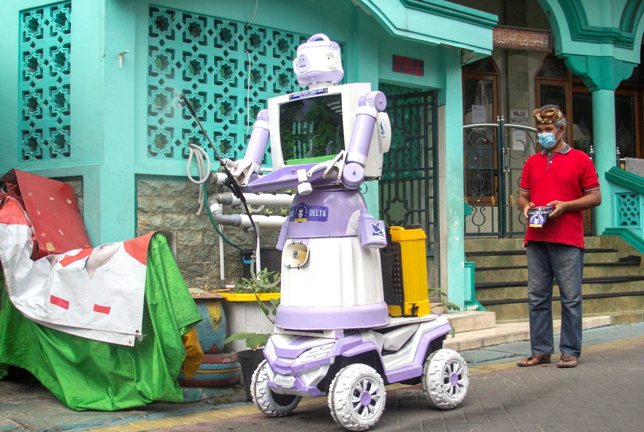Indonesian village turns unwanted trash into robot COVID-19 helper