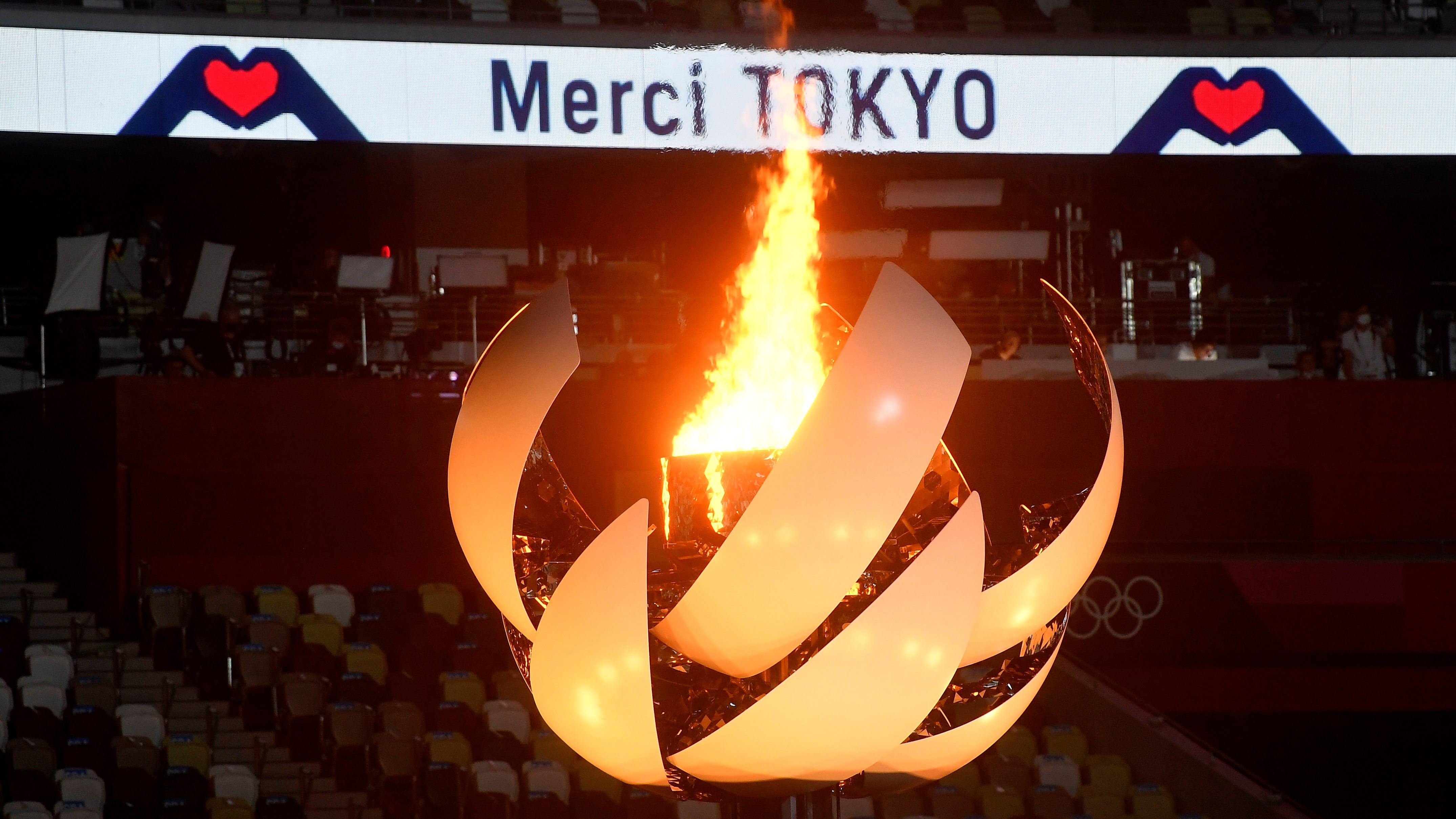 Tokyo douses Olympic flame, ending pandemic Games