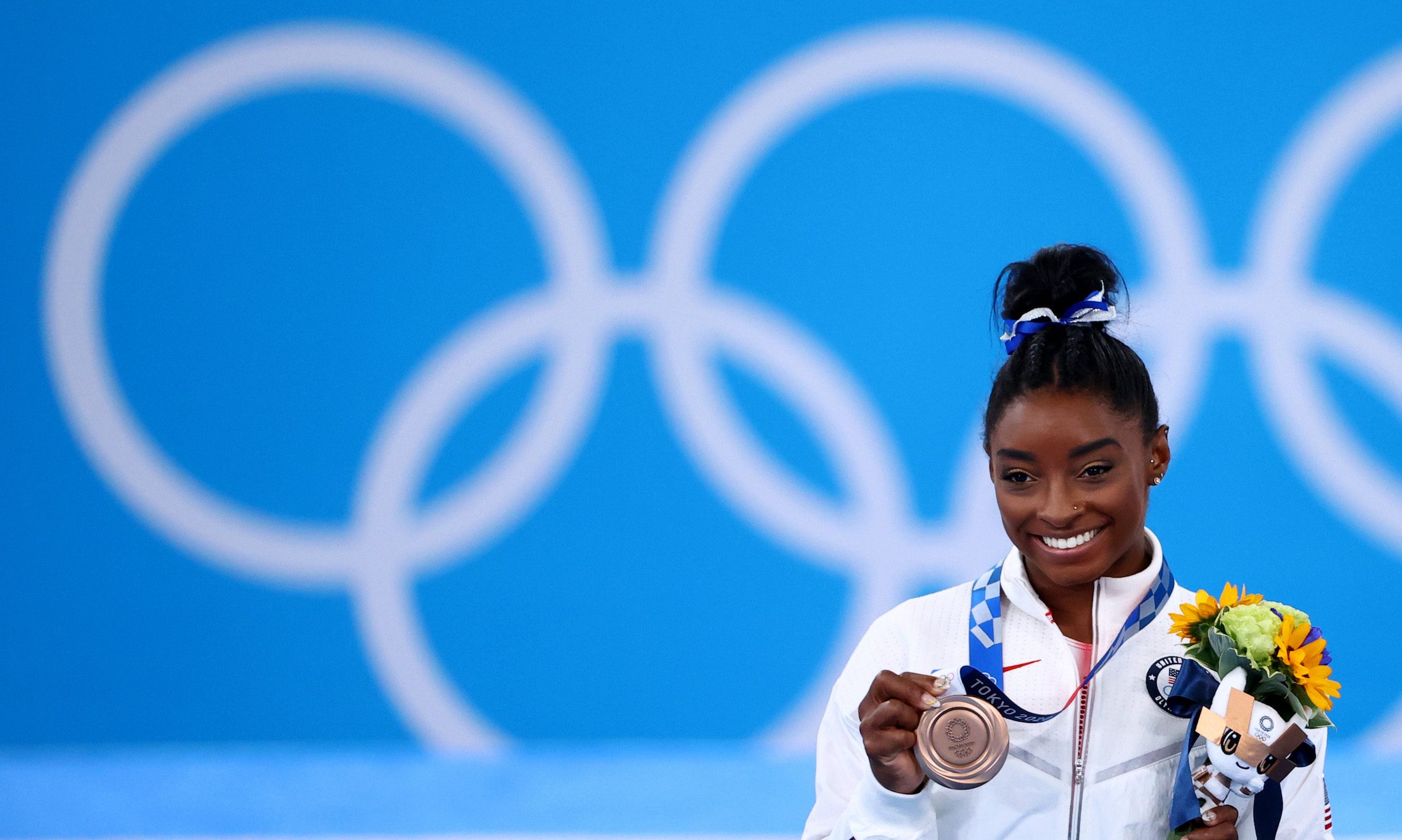 Simone Biles fights off fears, ‘twisties’ to claim ‘sweeter bronze than Rio’