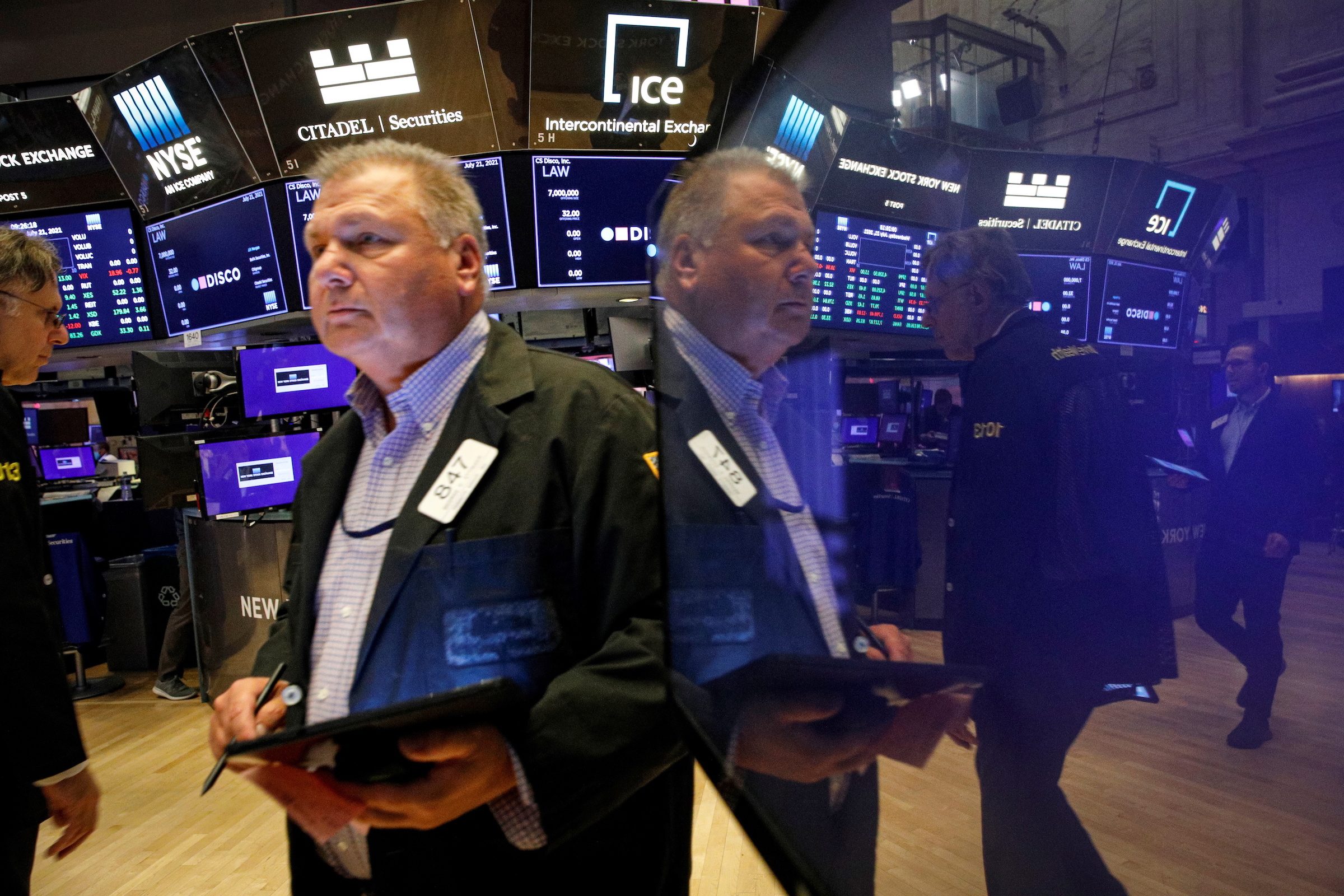 Wall Street hits records on economic optimism; dollar falls