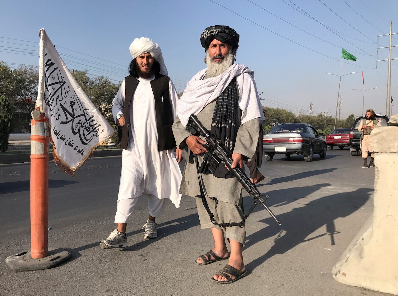 Taliban go door-to-door telling fearful Afghans to work