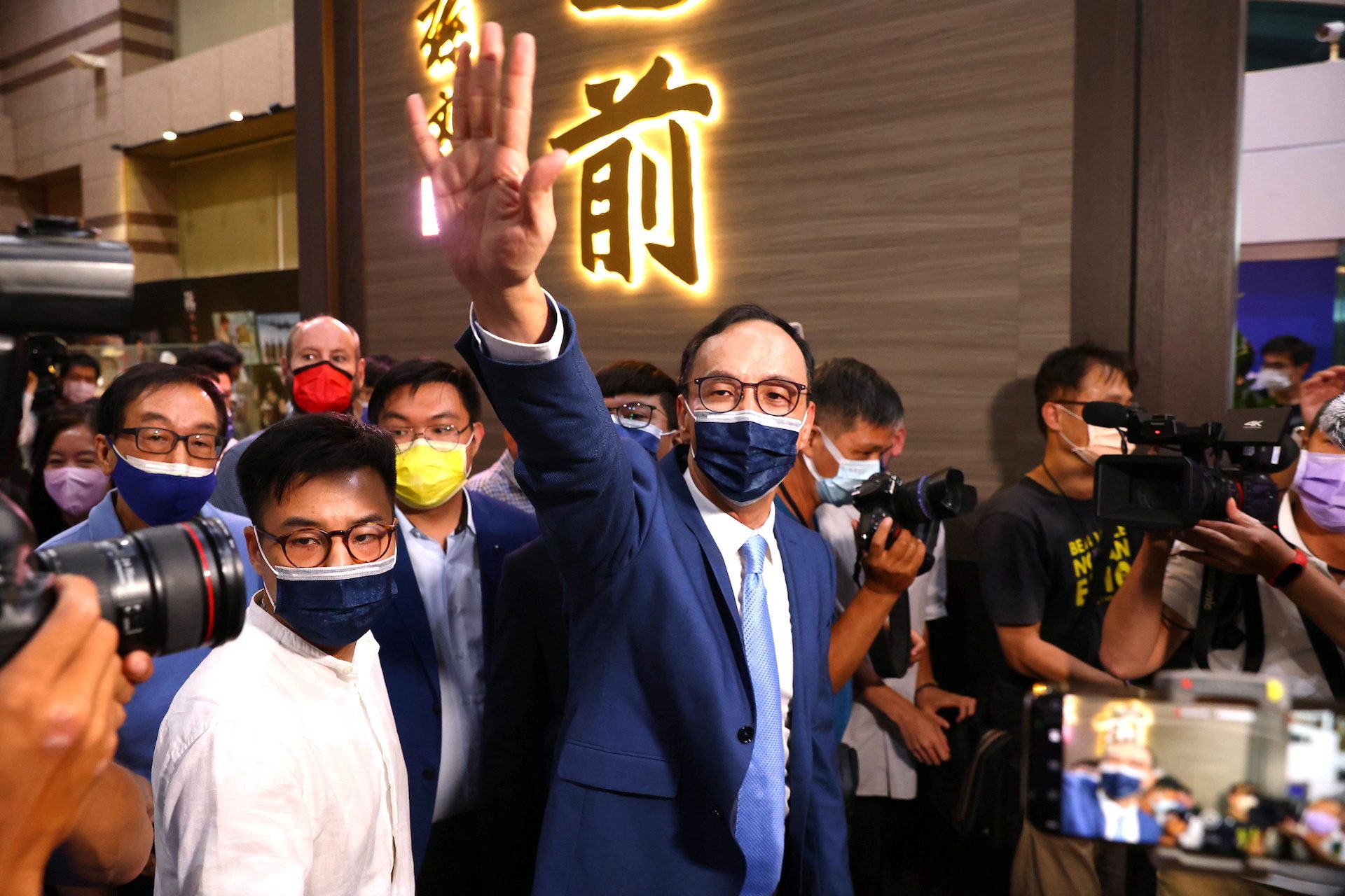 Scuffles in Taiwan parliament, premier blocked from podium in COVID-19 dispute
