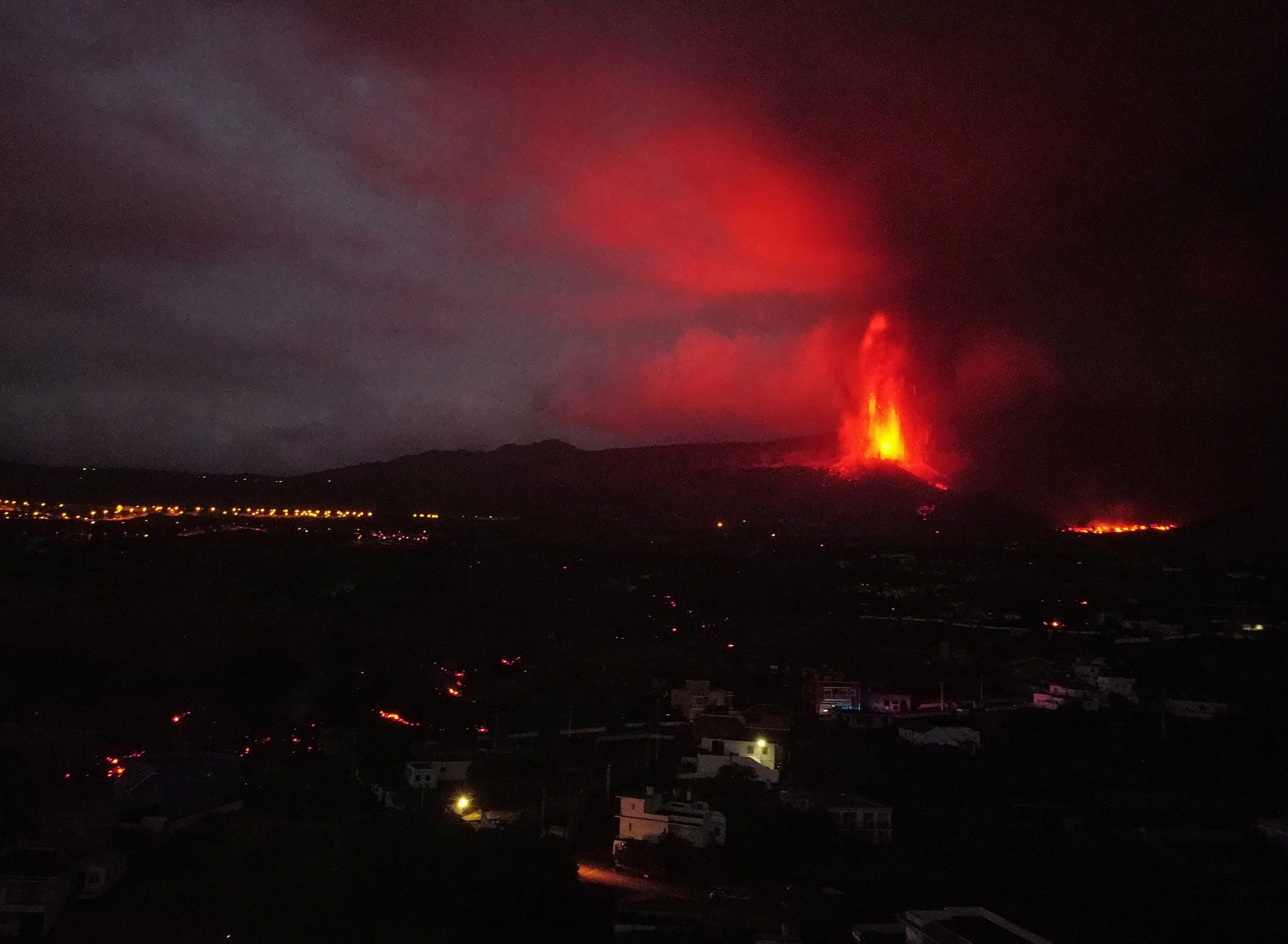 Canaries volcano blasts lava into the air as ash blankets area