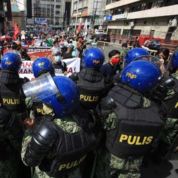 Police block protesters during Martial Law anniversary demonstration