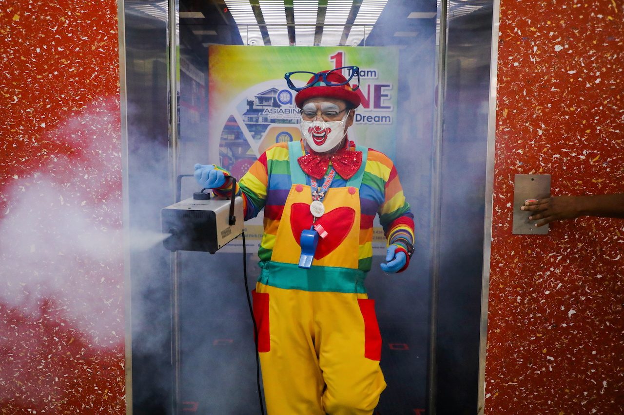 Malaysia’s germ-busting clown finds new role in pandemic