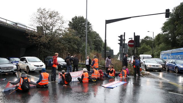 British police arrest 13 climate activists who blocked Heathrow airport access road