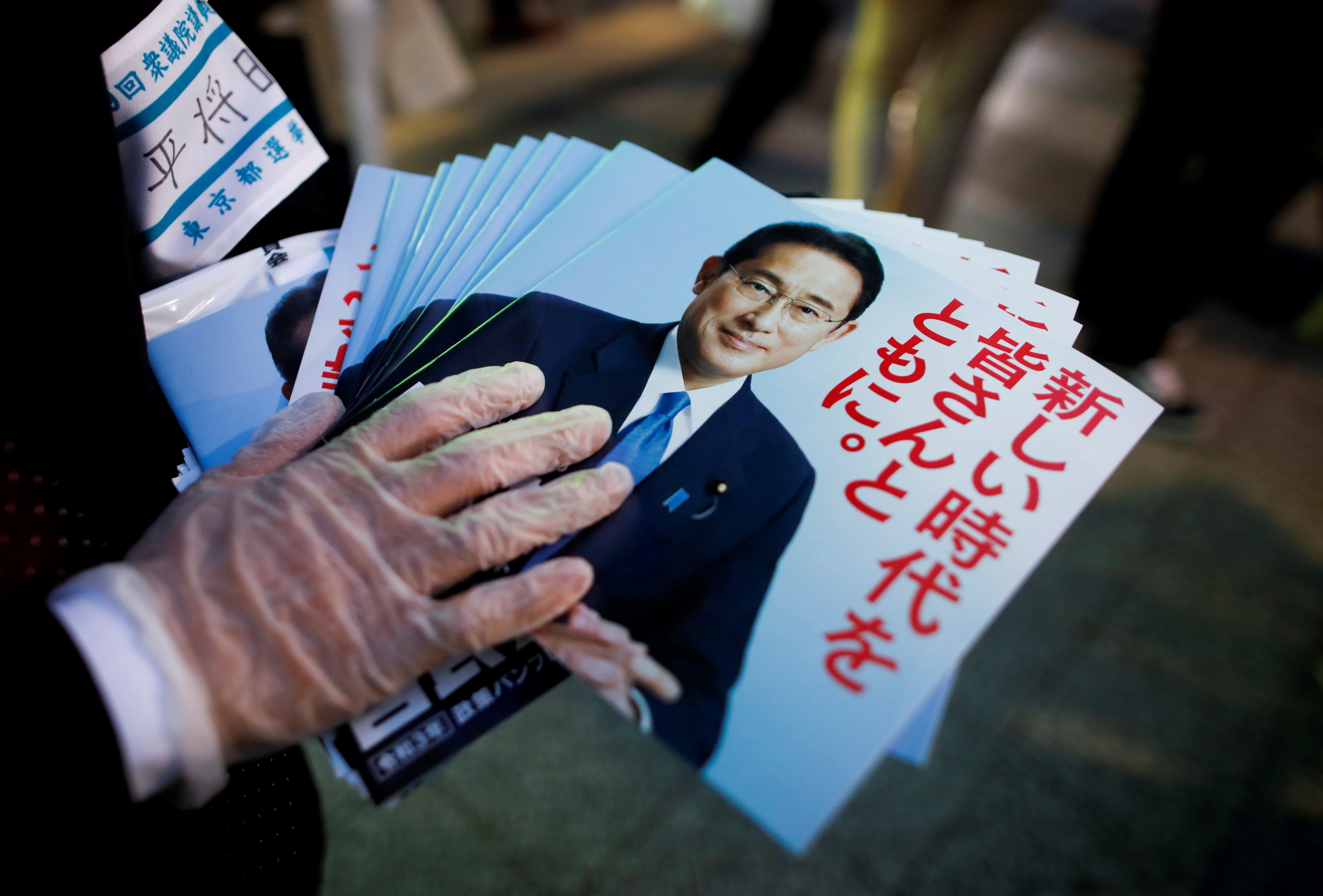 Japan ruling party set for likely battering in weekend election, but coalition safe