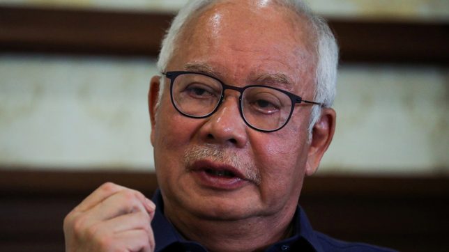 Malaysian court releases convicted ex-PM Najib’s passport for trip to Singapore