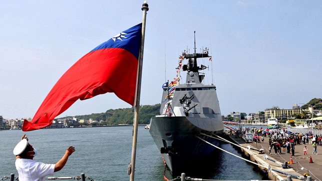 Taiwan says don’t get too close as China defends military drills
