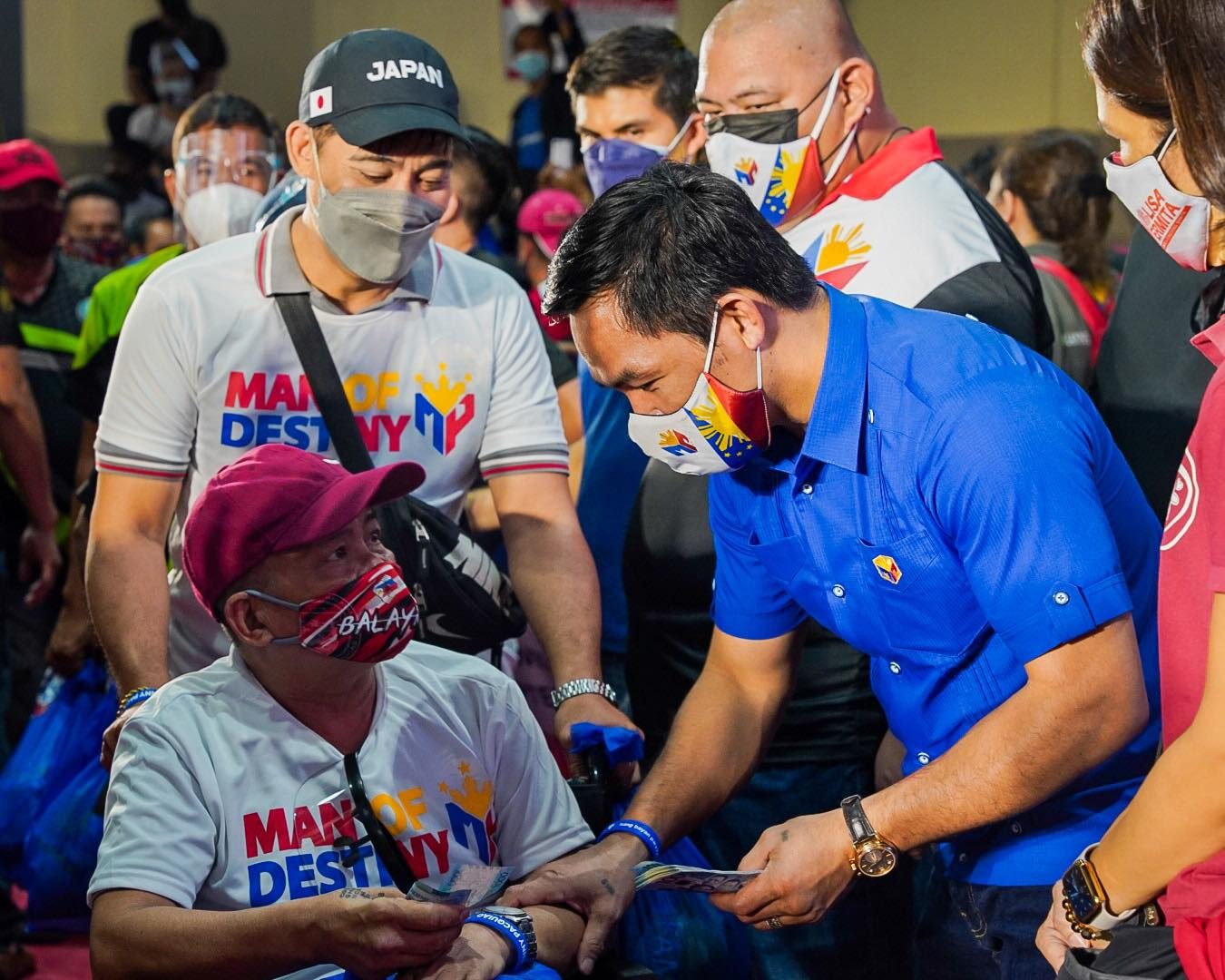 Pacquiao, ‘adopted son’ of Batangas, comes home to give cash aid