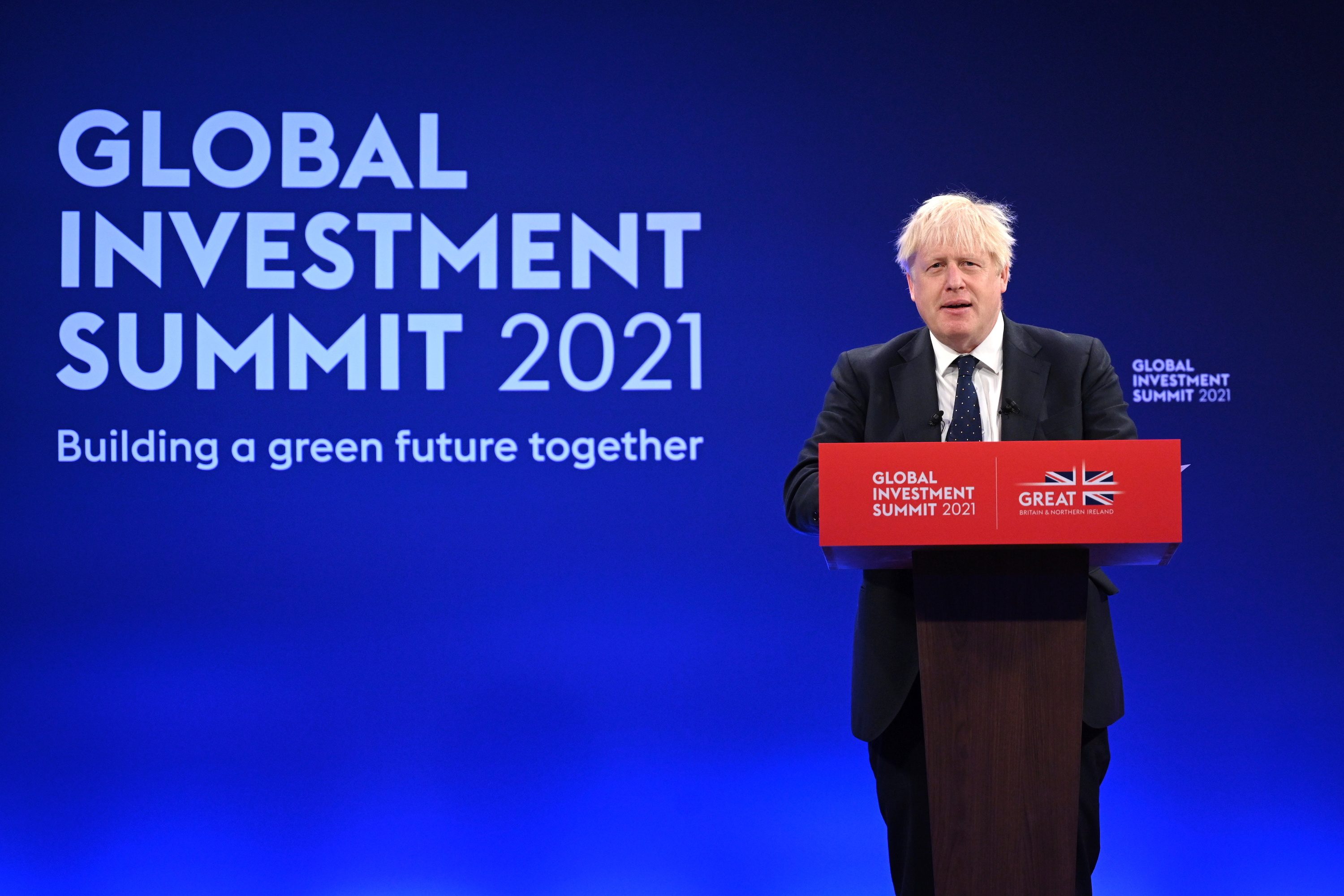 ‘Green is good,’ says UK’s Johnson, wooing Wall Street dollars