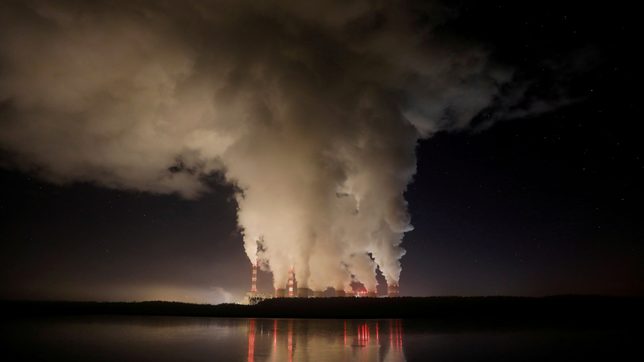 Britain tells climate talks coal era ending as carbon emissions surge
