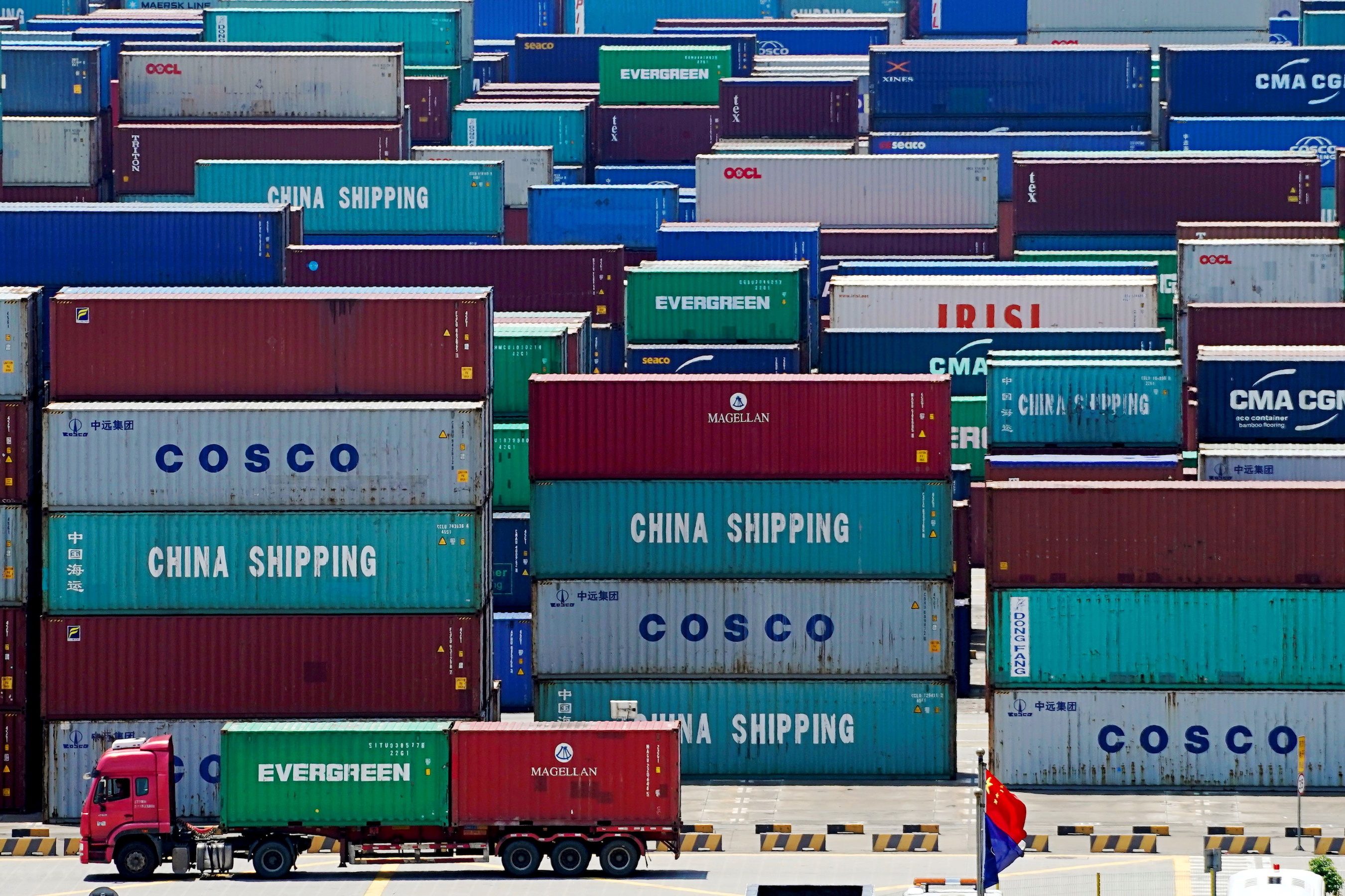 China exports beat forecasts, offer buffer to slowing domestic economy