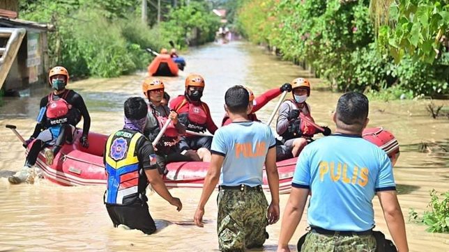 As floodwaters ebb, rescue operations continue in Davao