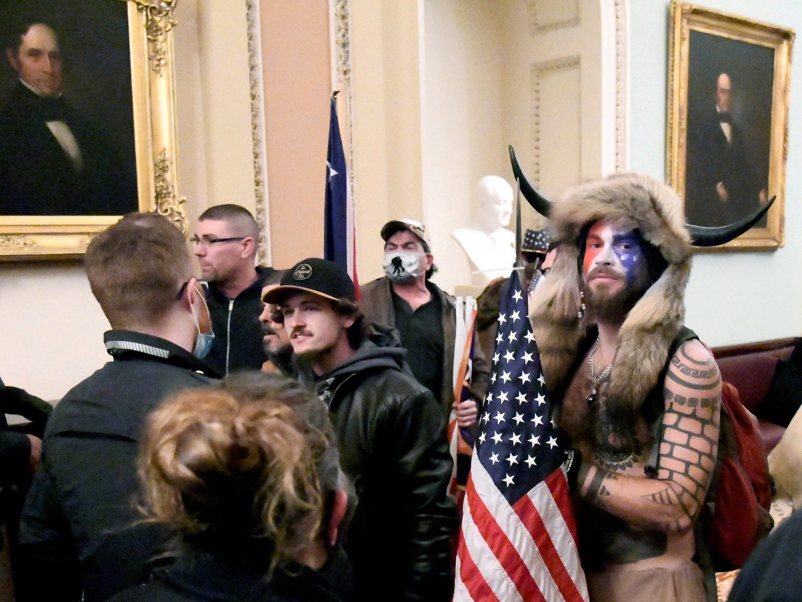 US seeks 4 years in prison for Capitol rioter ‘QAnon Shaman’