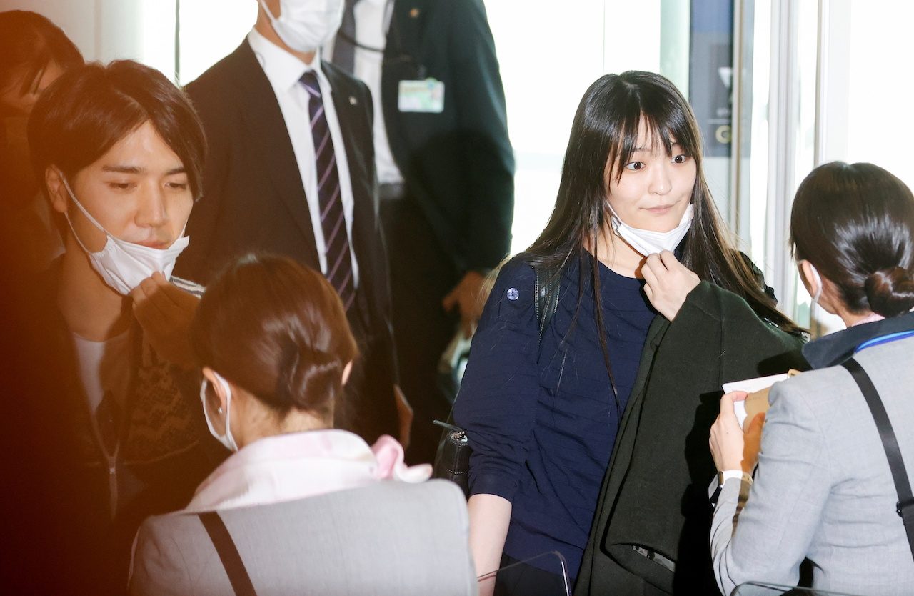 Japan’s ex-princess Mako, new husband depart for life in US